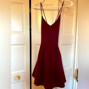 Dark plum backless strap dress with tulle underneath skirt